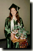 My sister, with her gifts for her graduating classmates.