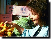 Mom looks at persimmons.