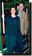 Parents on a trolley car.