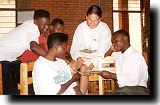 Saul teaching a group of students